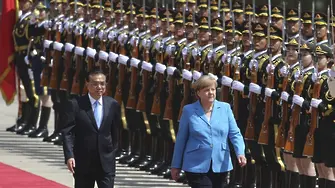 Меркел от Пекин: Германия и Китай подкрепят Иран