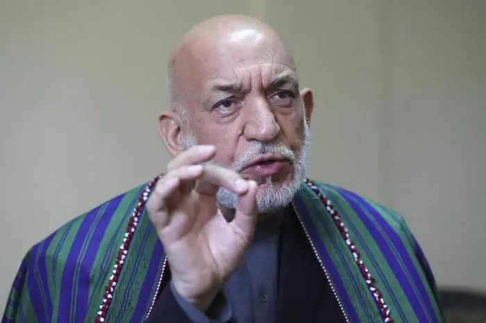 Талибански командир се среща с бивш президент на Афганистан