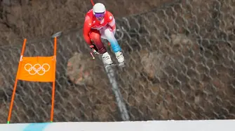 Швейцарец триумфира в спускането при мъжете